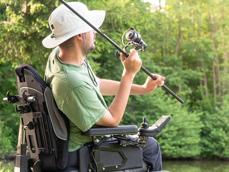 Man in wheelchair fishing