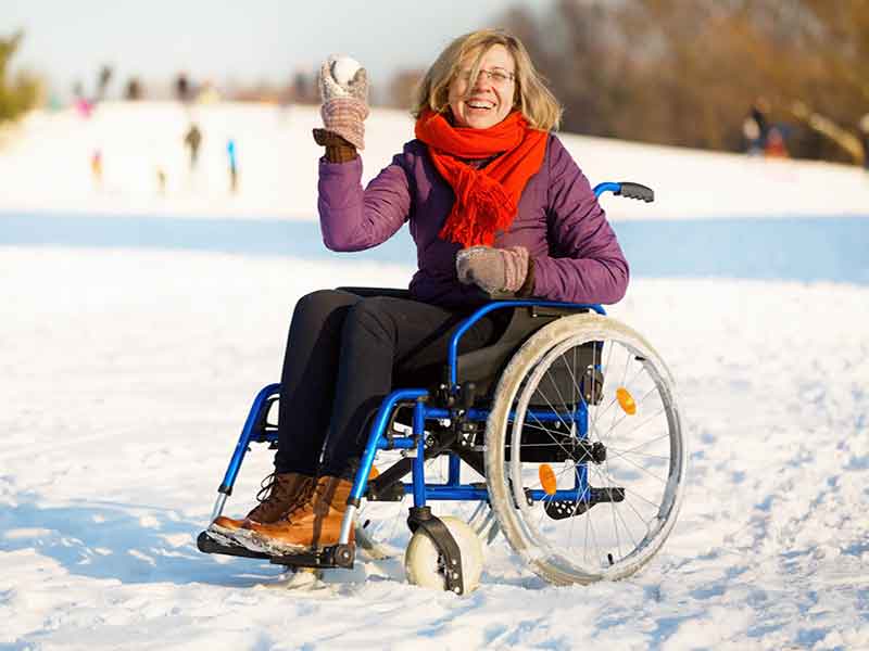 Woman in Wheelchair Snow
